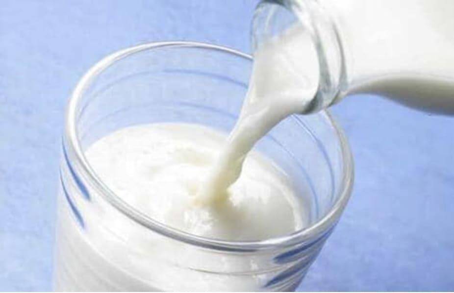 What happens when a person boils packaged milk before drinking?