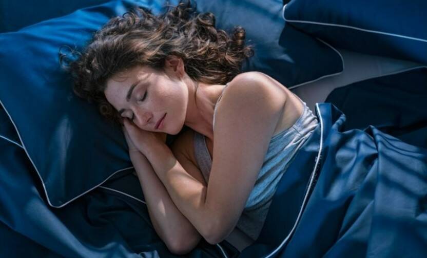 Which sleeping position is best for breast comfort and health?