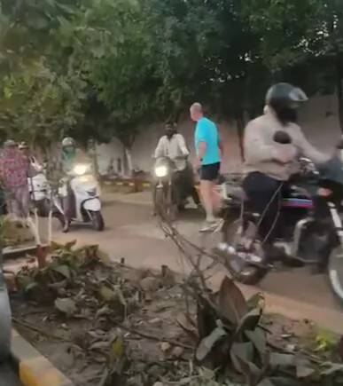 Foreigners seen stopping Pune locals riding motorbikes on footpath, refusing to give way