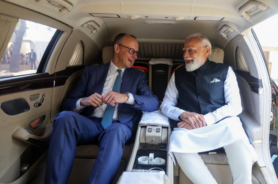 PM Modi and German Chancellor Merz travel in same car in Ahmedabad