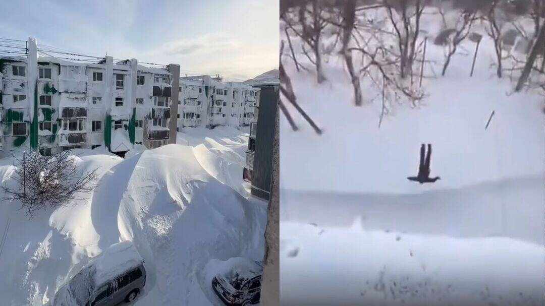Residents jump from buildings into deep snow in Russia's Kamchatka