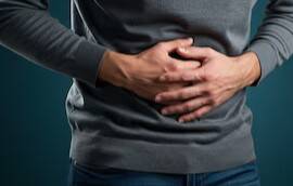 What are some common causes of abdominal bloating?