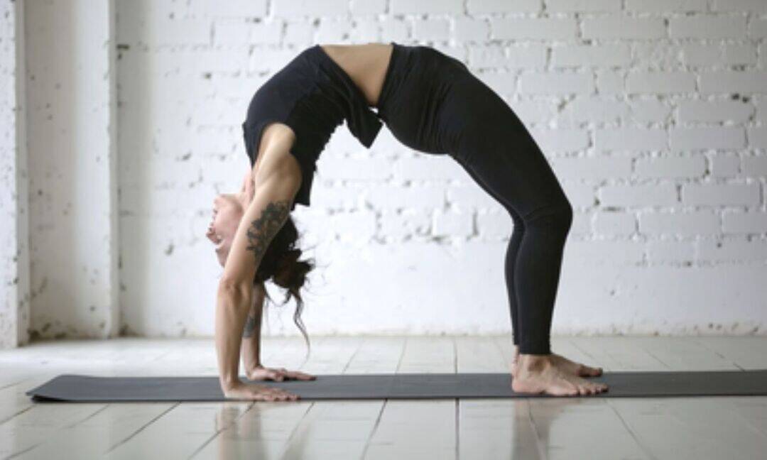 Chakrasana: A simple yoga pose to ease back pain