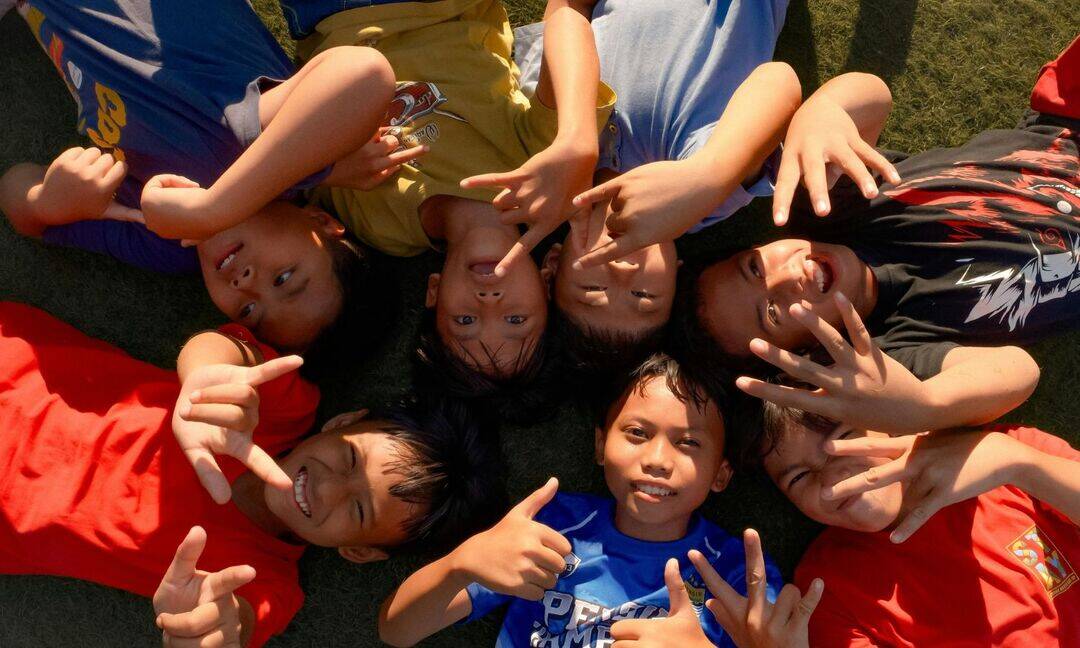 Why are children at risk during early heat waves?