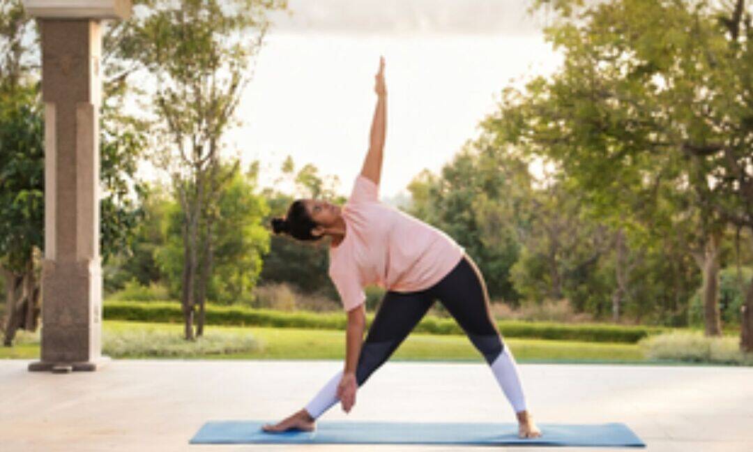 Trikonasana helps improve balance, flexibility and mental focus