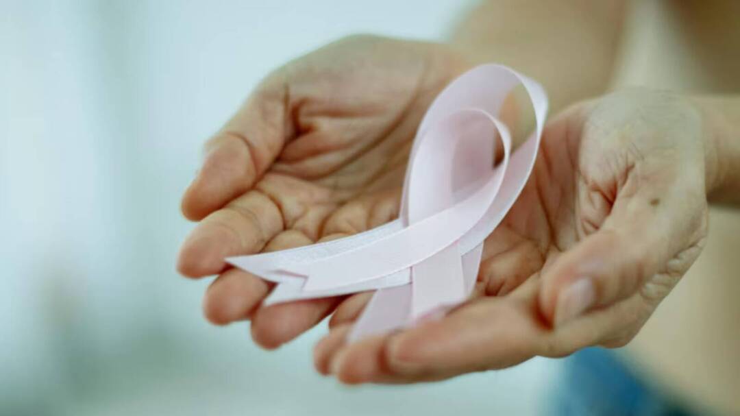 Why does cancer spread more in middle age than in old age?