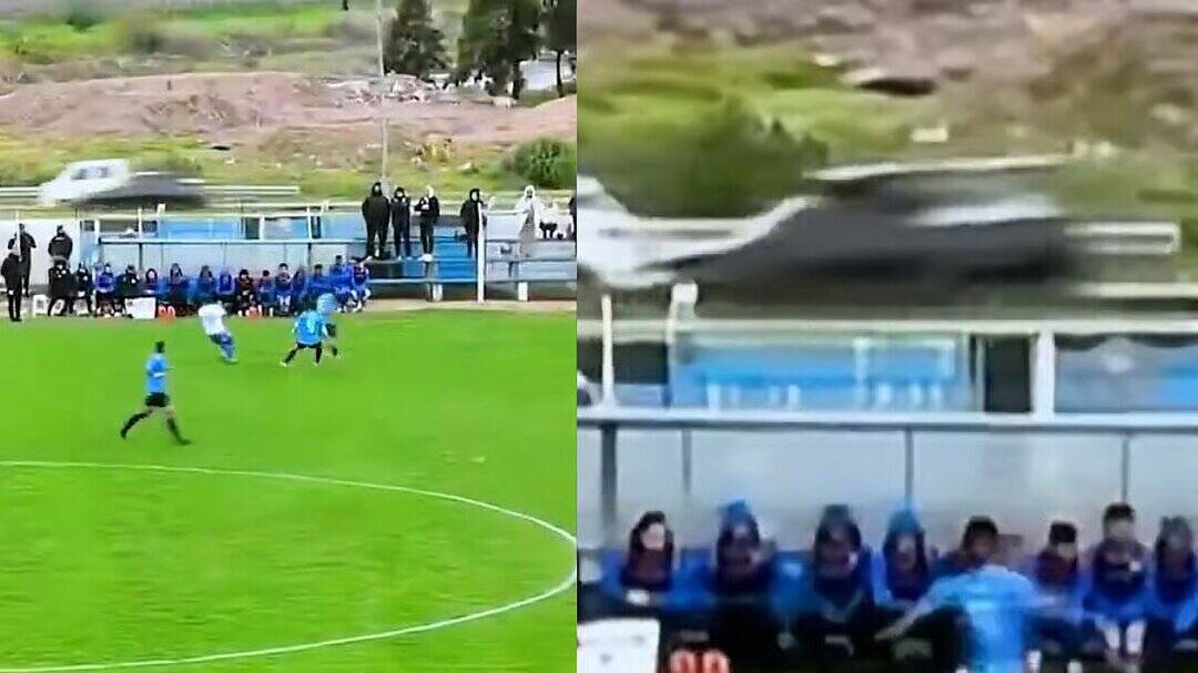 Footballer kicks ball out of stadium onto highway during match, triggers car crash on live TV