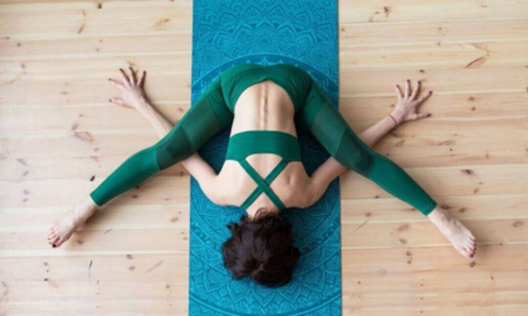 Kurmasana may support spinal health, flexibility and stress relief