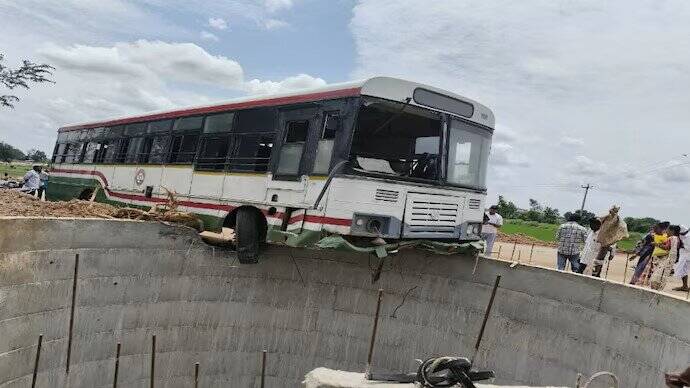 Bus stops inches from plunging into well after crashing through barrier in Telangana