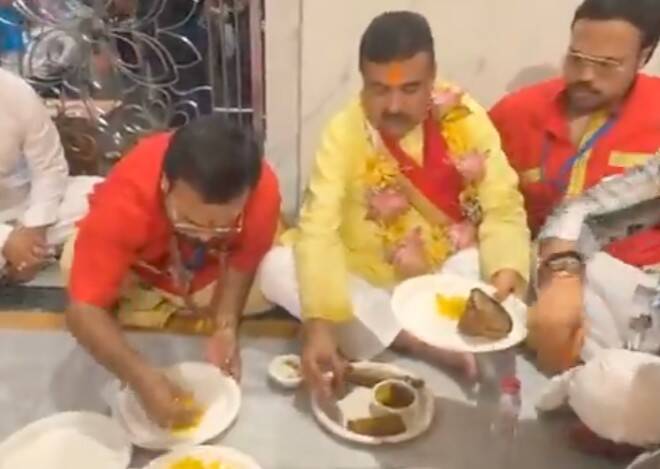 CM Suvendu eats fish in temple in Bengal amid row over Bageshwar Baba's meat ban call