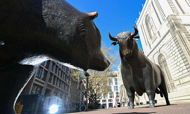 Dow rises but S&P, Nasdaq slip amid renewed AI concerns