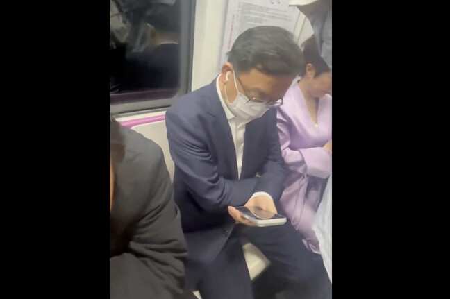 BYD's billionaire CEO Wang Chuanfu seen travelling in subway to auto show in China