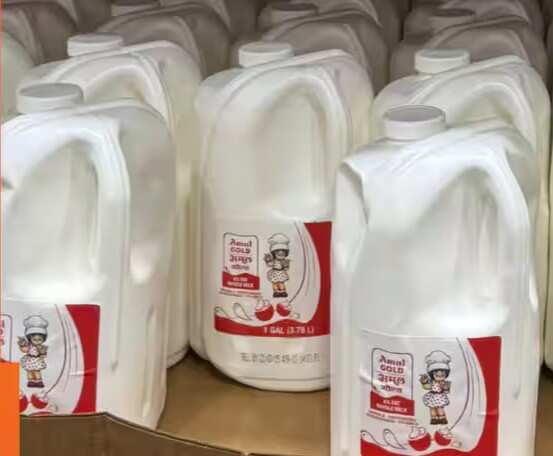 How much does Amul milk cost in US & China compared to India?