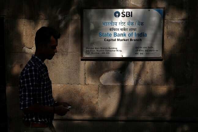 SBI holds job exam amid red alert, candidates wade through flooded roads in Ahmedabad