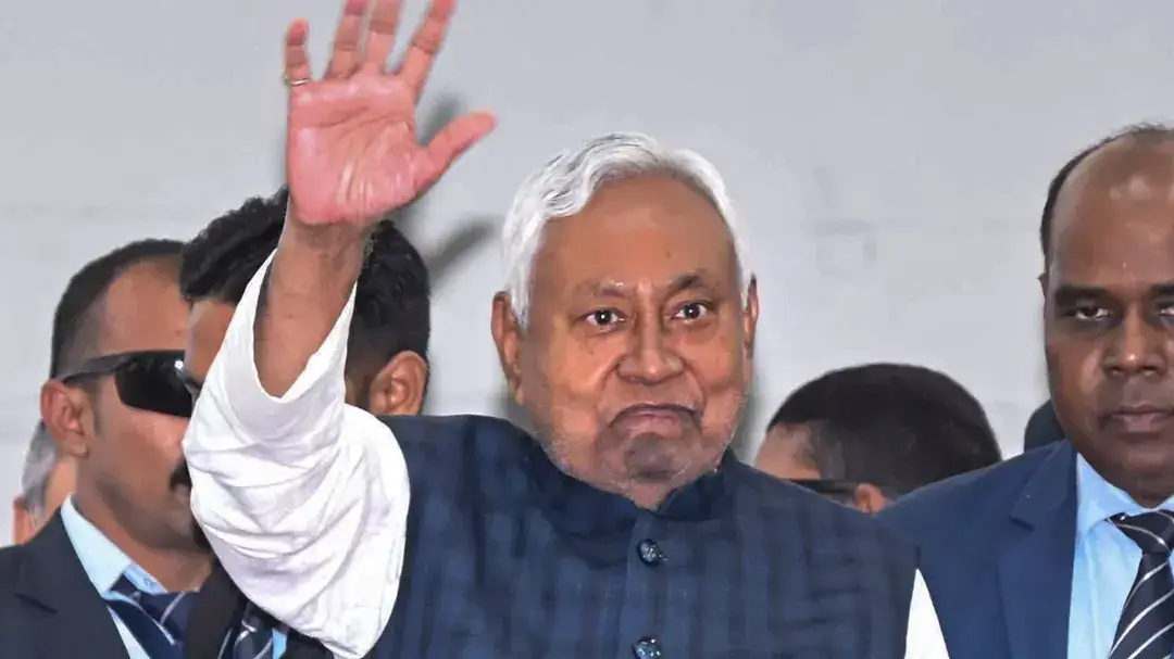 JD(U) workers assemble outside Bihar CM Nitish Kumar's residence